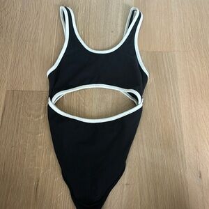 Out from under bodysuit bought at urban outfitters.